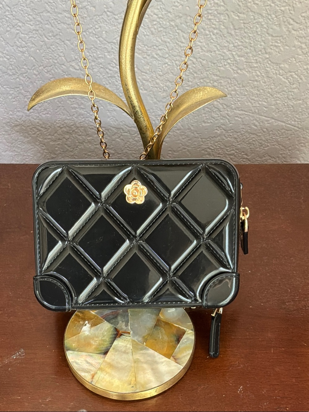 Black Quilted Patent Crossbody with Gold Flower Accent